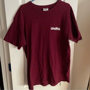 Men’s Undefeated In Strike Logo T-Shirt